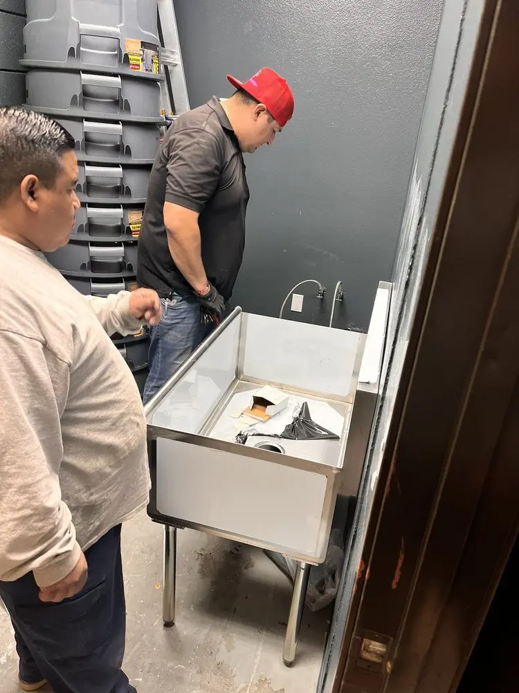 Commercial plumbing and sink installation in Brighton